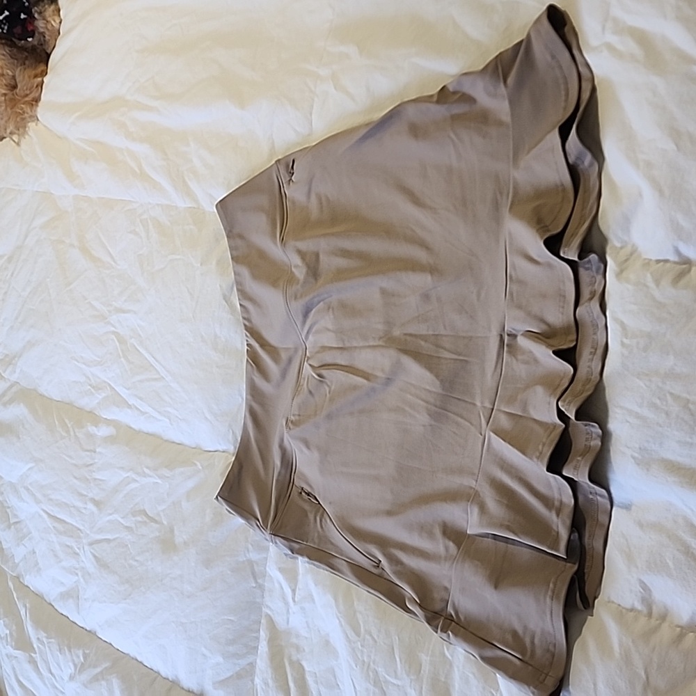 M Amazon active wear skirt cream tan with built in shorts ruffle zipper pockets